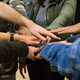 Come2Campus different hands on top of each other