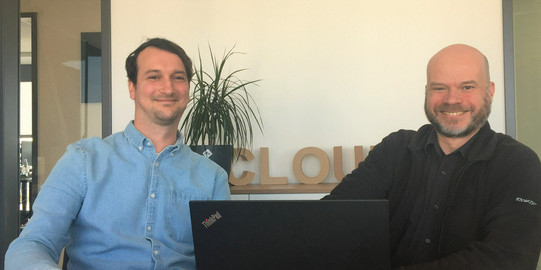 IKM_Erfahrungsbericht 2021 Zwei Mitarbeiter der Storm Reply GmbH